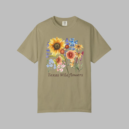 Unisex Texas Wildflowers t-shirt with hand-drawn florals on a Comfort Colors 1717 base. This soft cotton tee blends a soft girl aesthetic with classic country vibes. Perfect for spring picnics, nature photography, or small-town Texas festivals. Features iconic bluebonnets and pairs well with denim, boots, or sneakers for a blooming seasonal outfit.