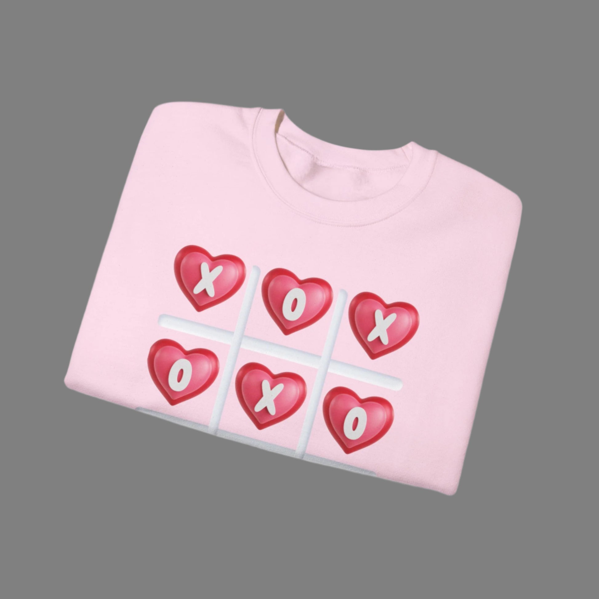 Image: XOXO Sweatshirt in Hot Pink, this crewneck pullover features a tic tac toe graphic with XOXO in 3D Conversation Hearts. Ideal as a teen gift for her or Galentines day. Available in Hot pink, light pink and black, by jaecrece