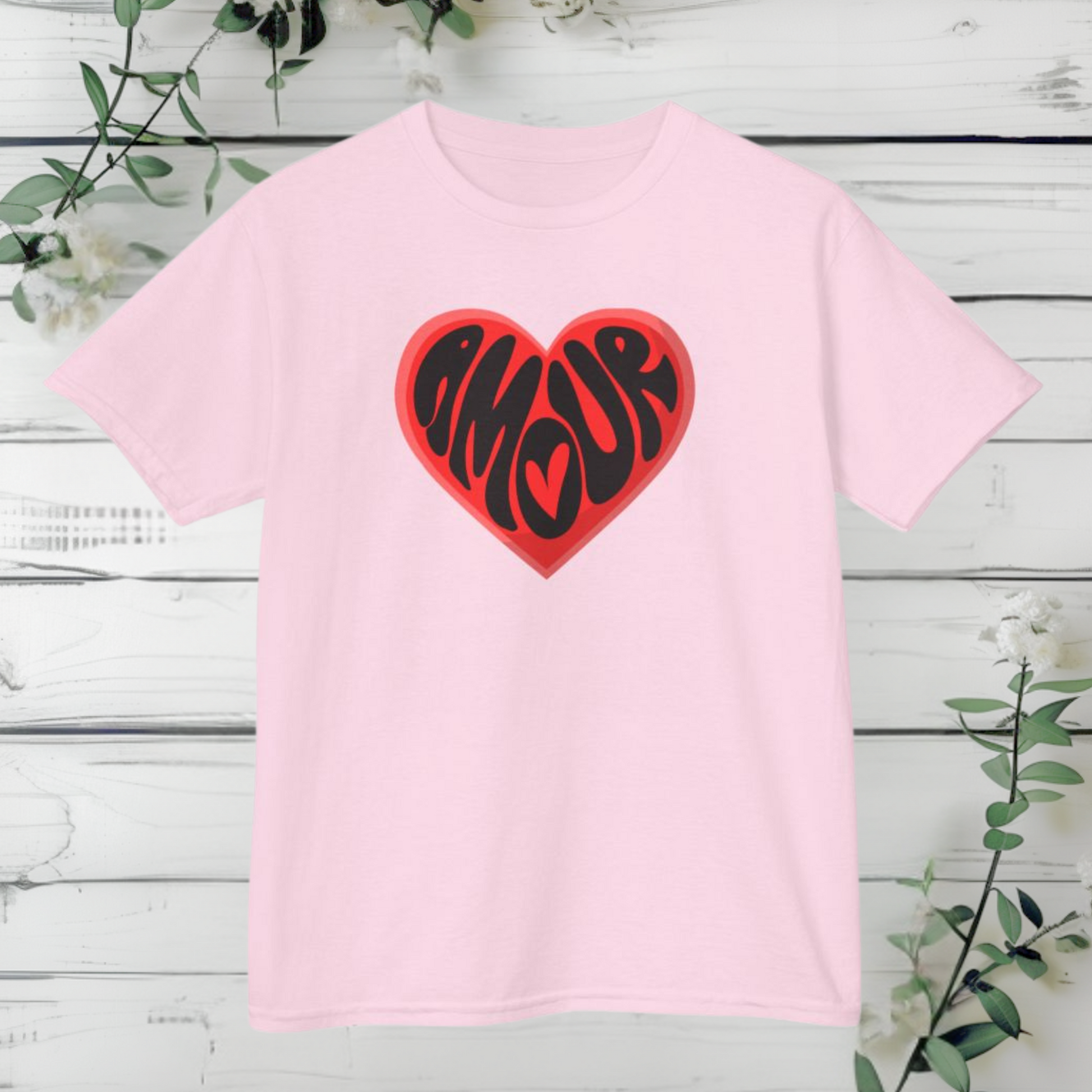 Celebrate Valentine’s Day with French flair in the Amour Love Girls T-shirt. Featuring the word “Amour” inside a heart graphic, this stylish tee fits sizes XS–XL and is perfect for girls who love coquette fashion and Parisian style. A great Valentine’s gift for your daughter or for mommy and me matching outfits, this shirt is ideal for school parties, Galentine’s, or everyday casual looks with a pop of pink love.