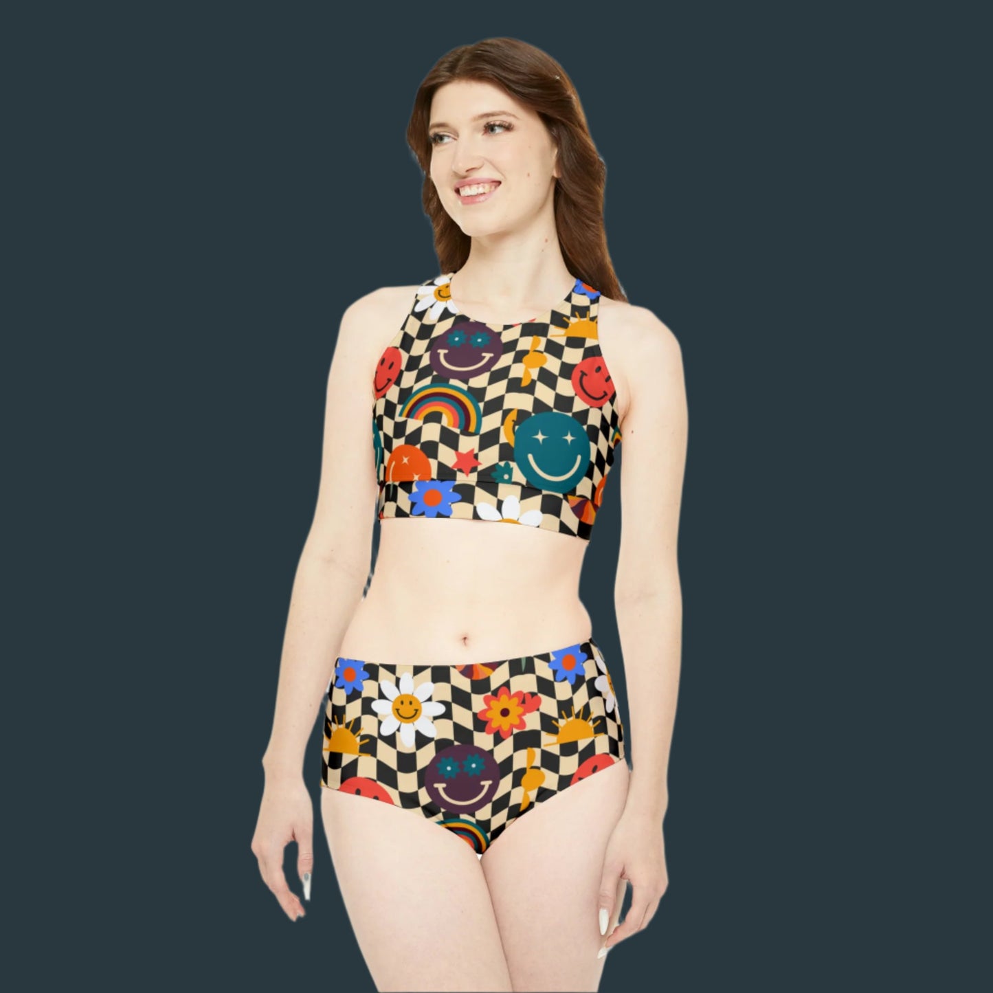 Smiley Face Checkerboard Womens Two Piece Sporty Bikini. This cute athletic ladies bathing suit features a black and khaki checkerboard background, with smiley face, rainbow and daisy graphics. It is perfect for swimming, vacations and athletic events. By jaecrece.com