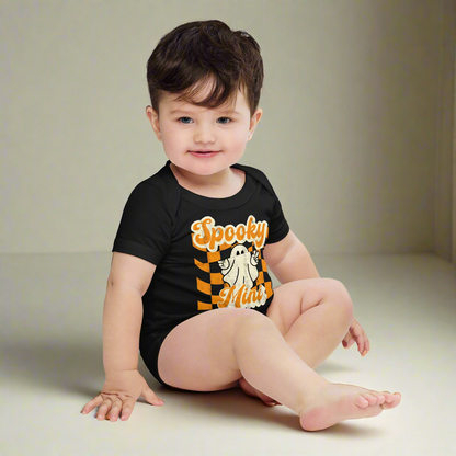 Spooky Mini Baby Bodysuit onesie, featuring an orange checkerboard pattern with a cute ghost and the text Spooky Mini, by jaecrece