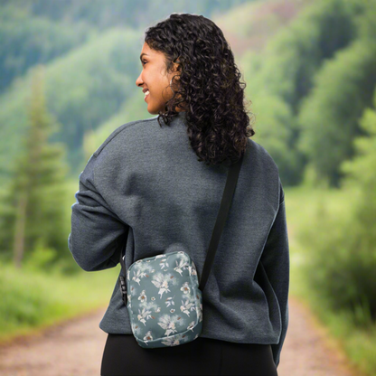 Grey small canvas crossbody utility bag, with a repeating fairy, floral and pinecone pattern. This hiking biking small tote can be worn on the hips, waist or cross the chest. The perfect gift or festival pouch for ladies, teens and tween. By jaecrece