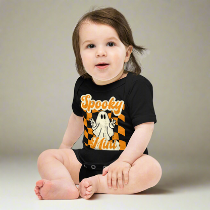 Spooky Mini Baby Bodysuit onesie, featuring an orange checkerboard pattern with a cute ghost and the text Spooky Mini, by jaecrece