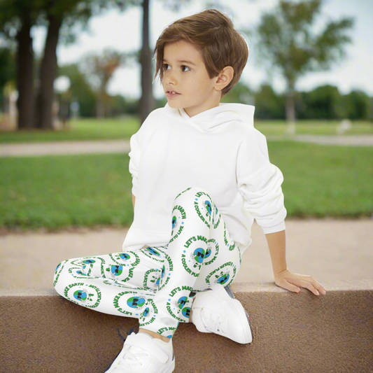 Image: Pair of youth Earth Day leggings featuring a vibrant global warming cartoon of a sunglass wearing Earth -design with green continents, blue oceans, and the slogan Lets Make Earth A Cooler Place to Live; printed on a white background.