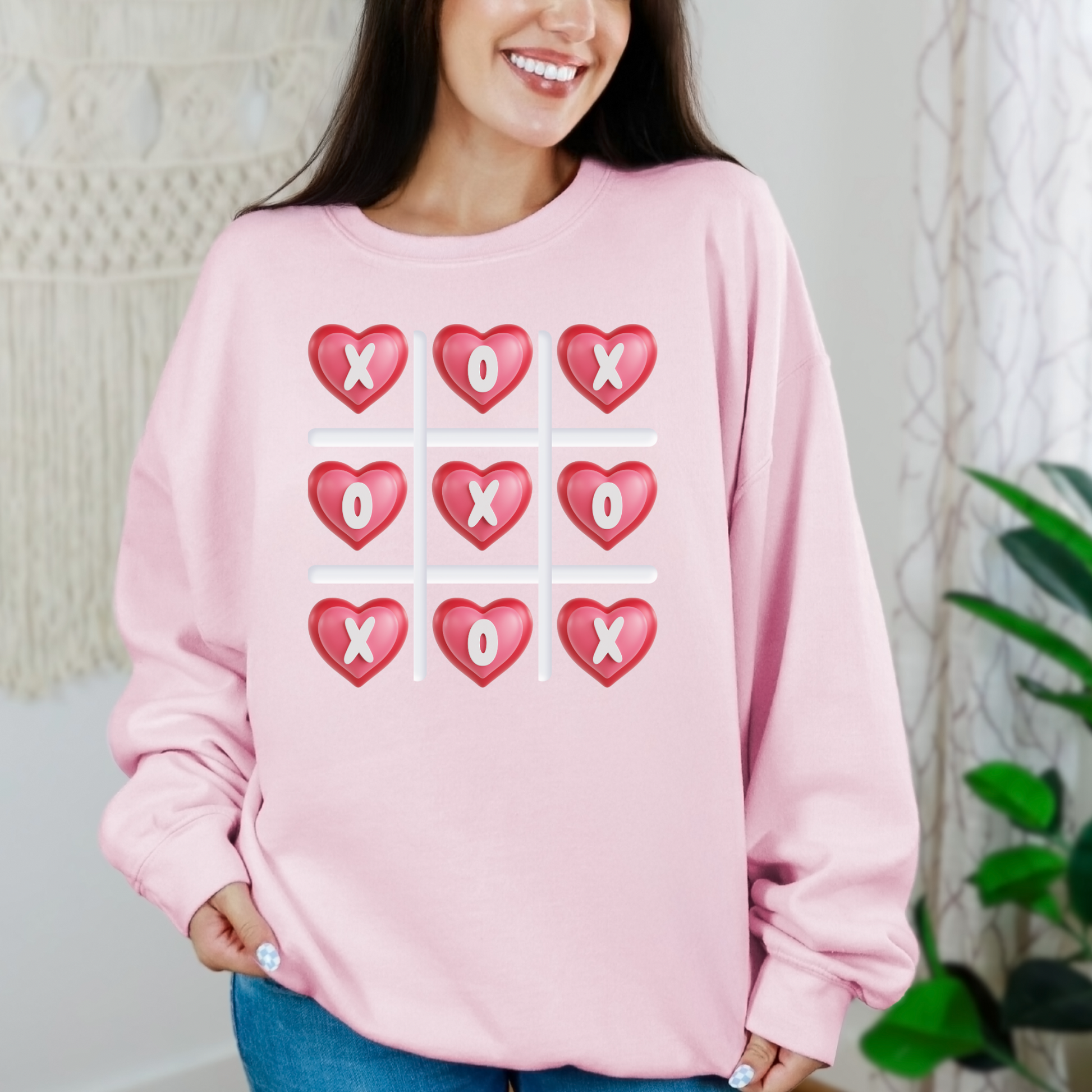 Image: XOXO Sweatshirt in Hot Pink, this crewneck pullover features a tic tac toe graphic with XOXO in 3D Conversation Hearts. Ideal as a teen gift for her or Galentines day. Available in Hot pink, light pink and black, by jaecrece