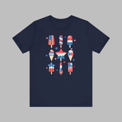 Image: From fireworks to festivals, this red white and blue popsicle shirt is your go to for every patriotic event. Created for adults and available in sizes XS to 5XL, this fun and festive tee celebrates the 4th of July with comfort and flair. Whether you’re honoring Memorial Day or joining a parade, this soft American pride shirt is a summertime staple, by jaecrece.