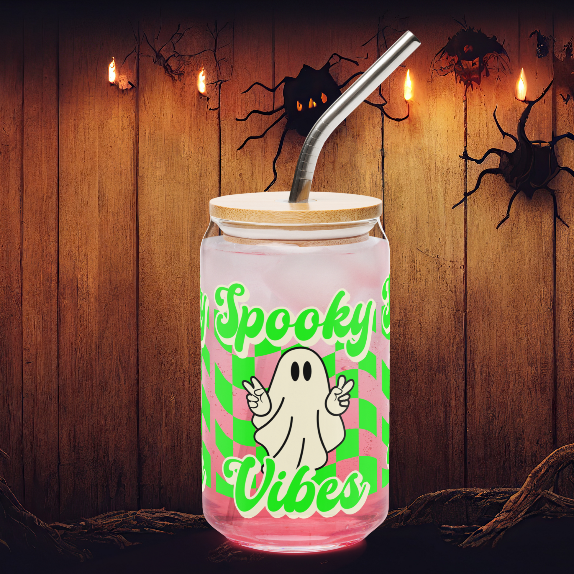 Stylish and functional, this ghost glass tumbler with bamboo lid and reusable glass straw is designed for iced coffee lovers who celebrate Halloween in style. Featuring a wavy checker pattern and “spooky vibes” message, it’s a perfect 16 oz fall sipper. Ideal for eco-conscious shoppers, Halloween gift sets, or ghost-themed kitchen décor, it’s a fun seasonal drinkware essential.

