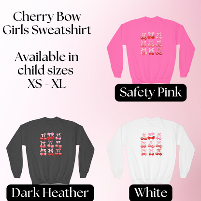 Image: Cherry Bow Girls Sweatshirt, available in Hot pink, White and dark gray. This coquette aesthetic shirt features 9 different cherries with bows, making a large soft girly graphic. Makes a great Valentines gift for toddlers and little girls, by jaecrece