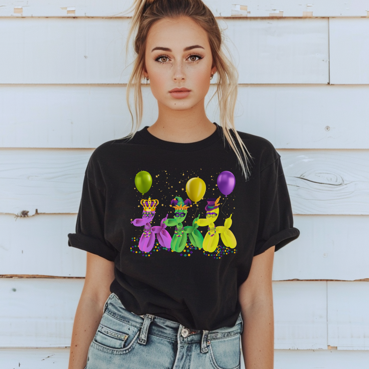 Image: Mardi Gras Balloon Dog Adult Shirt. This New Orleans Carnival tee features three balloons dogs, wearing Mardi Gras masks and hats. They have beads and balloons with confetti, by jaecrece