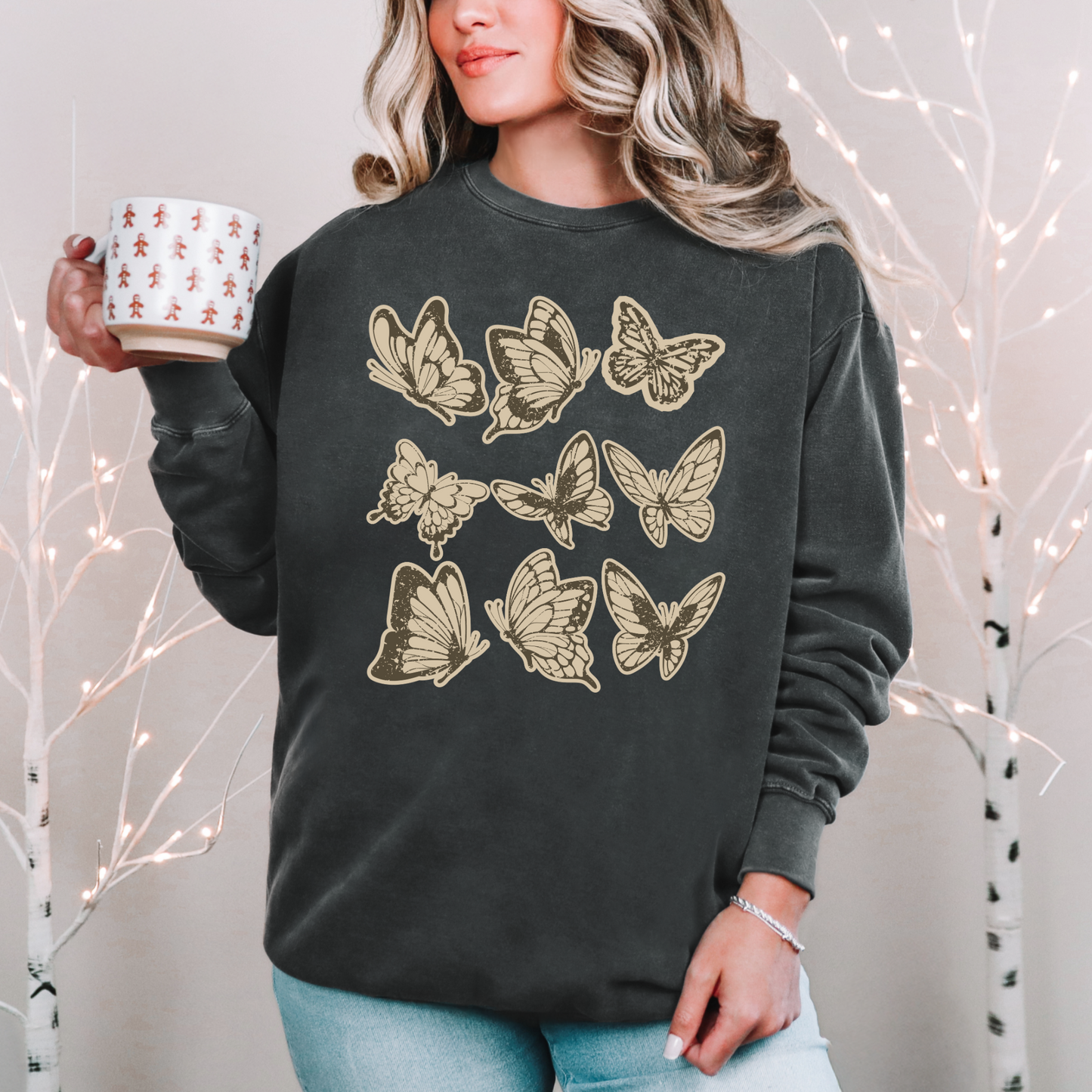 Image: Vintage style butterfly sweatshirt featuring a cozy crewneck pullover design. Adorned with 9 intricately detailed butterflies in a scrapbook inspired brown and cream paper texture, adding a rustic and artistic touch. Perfect for casual wear and nature lovers, by Jaecrece.