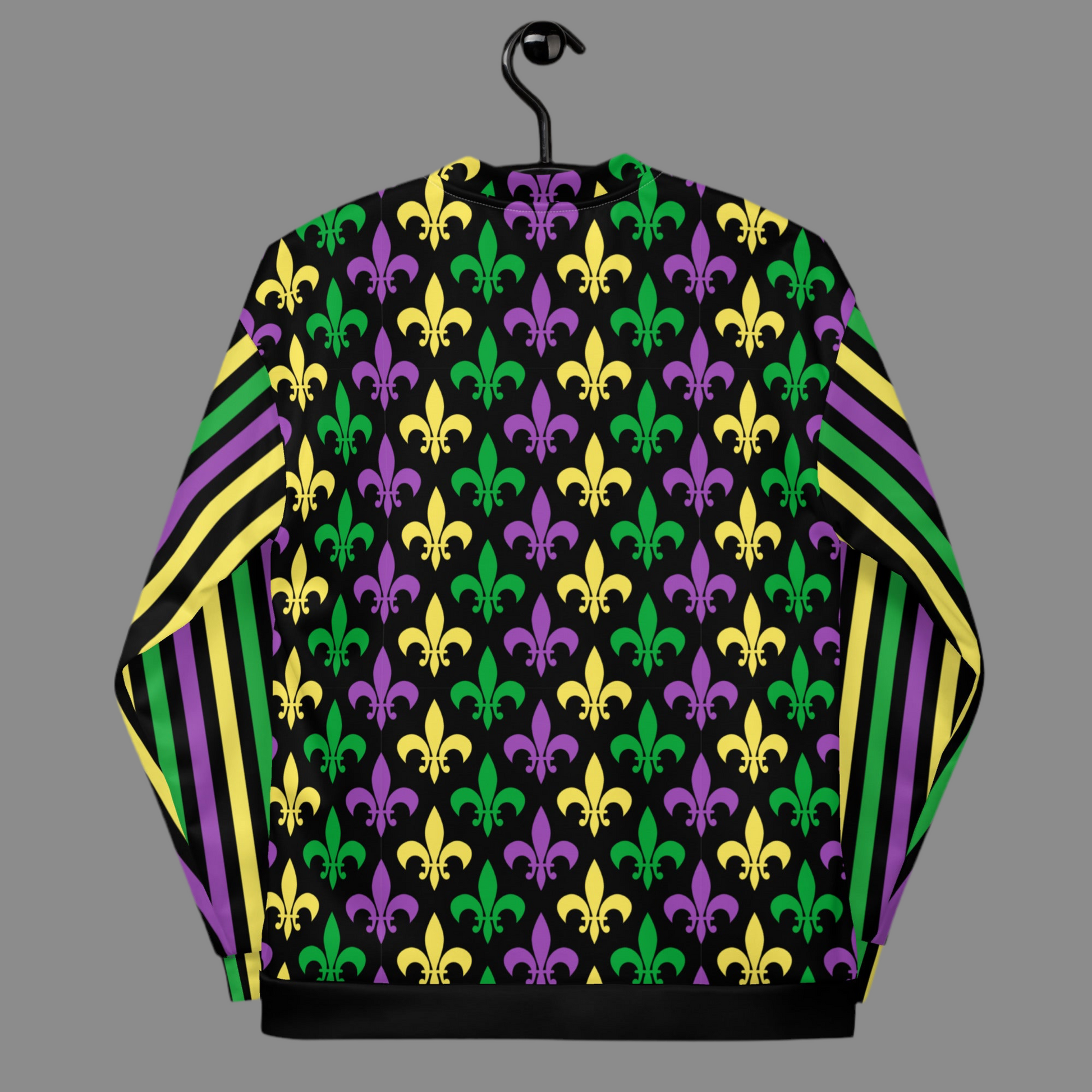 Image: Mardi Gras Unisex Bomber Jacket. This lightweight NOLA apparel is perfect for parades in the French Quarter, or Mardi Gras themed fun runs. It features a gold, green and purple fleur de lis pattern on the front and back, with gold, purple and green stripes going down each arm. Plus sizes available, by jaecrece