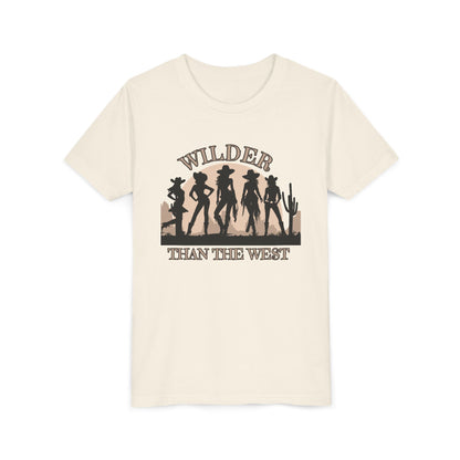 Natural youth shirt with “Wilder than the West” printed over five cowgirl silhouettes, sunset, and desert cactus. Available in sizes S–XL, this western cowgirl silhouette tee is perfect for southern girls who love state fair rides, western boots, and bold graphic quotes. Match it with women’s and toddler sizes for a coordinated mama mini look, ideal for rodeos, vintage festivals, and Texas-inspired fun.