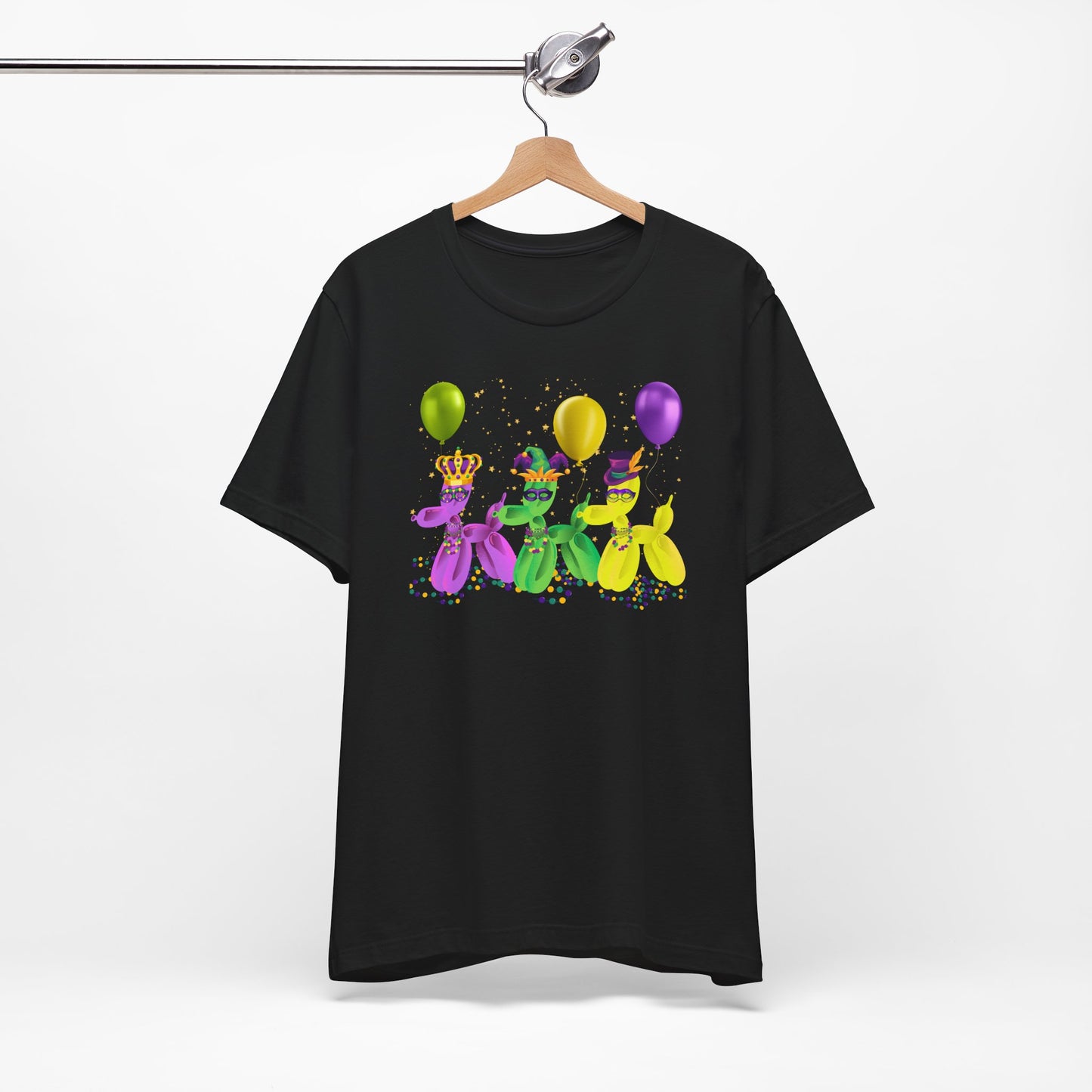 Image: Mardi Gras Balloon Dog Adult Shirt. This New Orleans Carnival tee features three balloons dogs, wearing Mardi Gras masks and hats. They have beads and balloons with confetti, by jaecrece