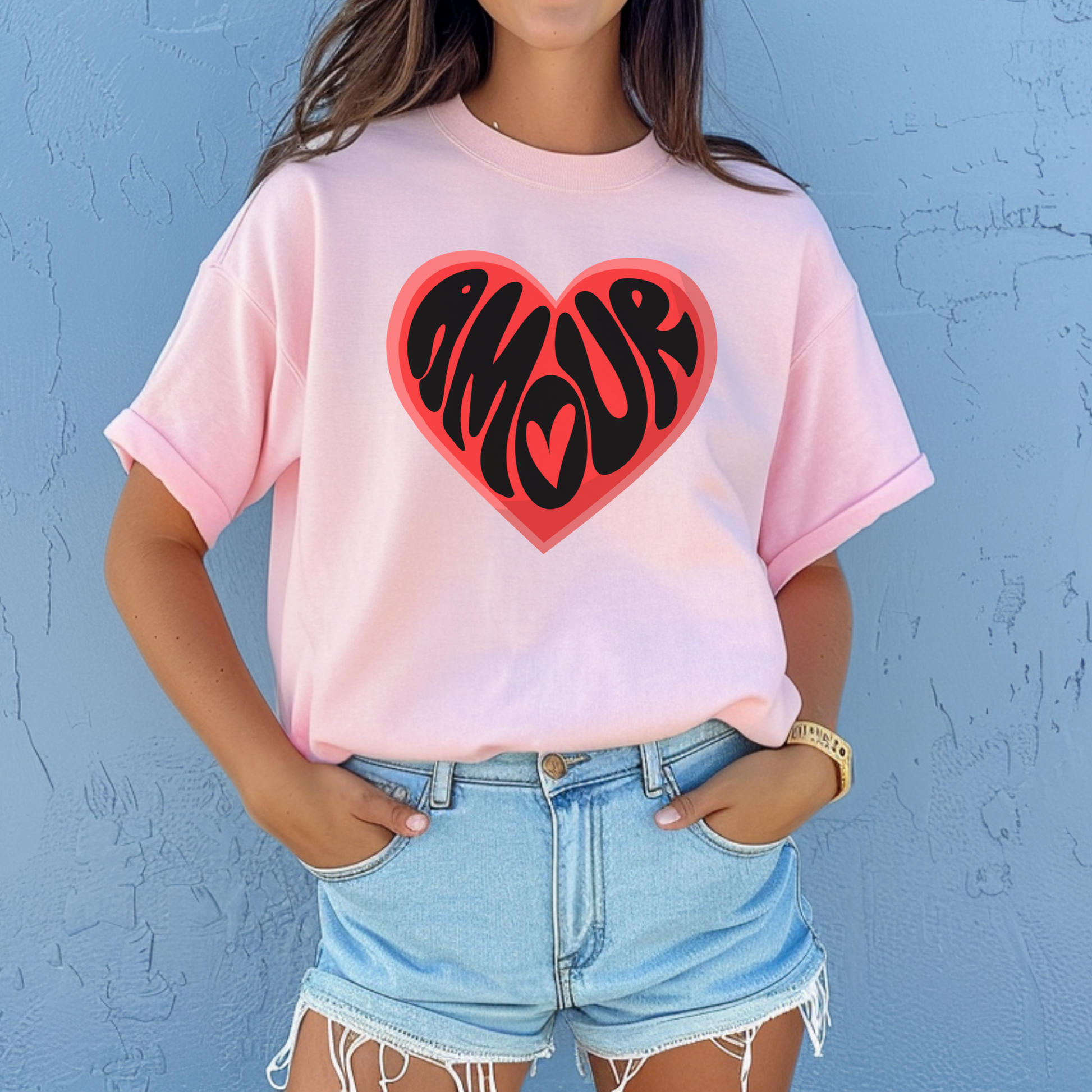 This Amour Love Women’s T-shirt brings Parisian flair to your Valentine’s Day outfit. With a bold heart graphic and the French word “Amour,” this coquette tee in sizes XS–5XL is perfect for moms, teachers, or stylish women who love French fashion. A cozy, feminine gift for a Francophile or for matching mommy and me looks. Ideal for casual Galentine’s parties, family photos, or romantic Paris getaways with a soft girl vibe.