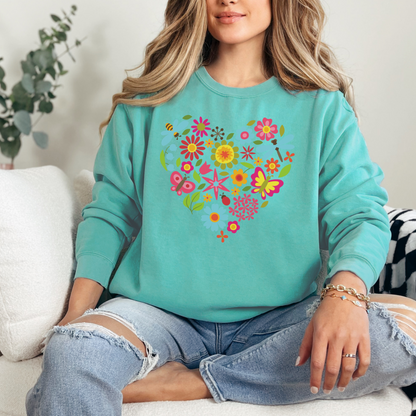 Image: Butterfly Heart Sweatshirt. This botanical pullover sweater is printed on a Comfort Colors©️ 1566 top, has a nature theme graphic of botanical flowers, honeybees, dragonflies, leaves. A romantic Valentine gift or Earth Day outfit, by jaecrece