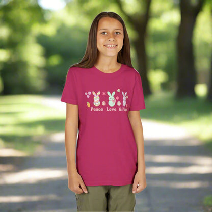 Image: Peace Love and Peeps Easter Shirt for Adults and Children. This Mommy and Me Match Easter Tee features Peeps Easter Candy with Easter Eggs and Daisies. A great Easter shirt for your family holiday celebrations, by jaecrece