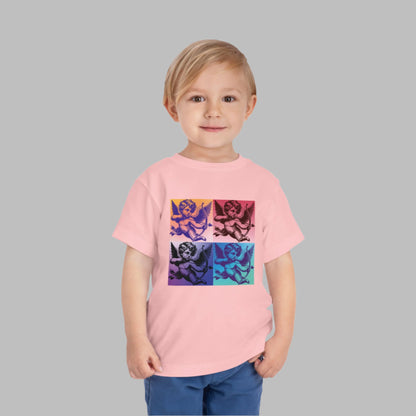Add some vintage-inspired pop art to your toddler’s wardrobe with this Pop Art Cupid T-shirt, featuring a fun Cupid graphic surrounded by clouds. Available in sizes 2T-5T and colors Black, White, and Pink, this tee combines a playful, artsy design with soft, breathable fabric for all-day comfort. Perfect for casual wear, family matching outfits, or Valentine’s Day celebrations, this t-shirt brings a pop of retro fun to your toddler's wardrobe.