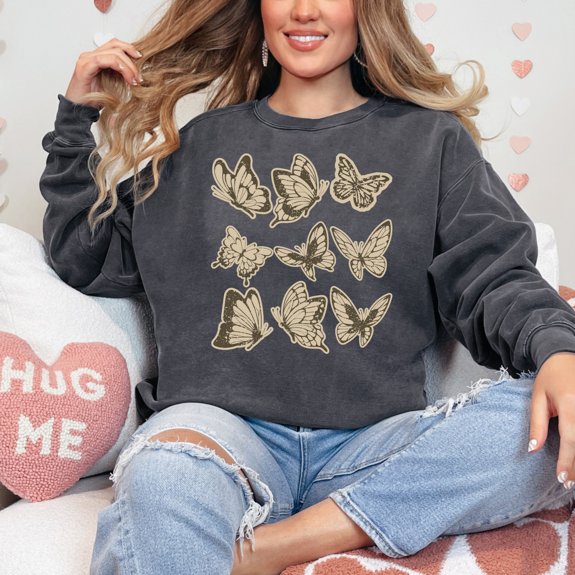 Image: Vintage style butterfly sweatshirt featuring a cozy crewneck pullover design. Adorned with 9 intricately detailed butterflies in a scrapbookinspired brown and cream paper texture, adding a rustic and artistic touch. Perfect for casual wear and nature lovers, by Jaecrece.