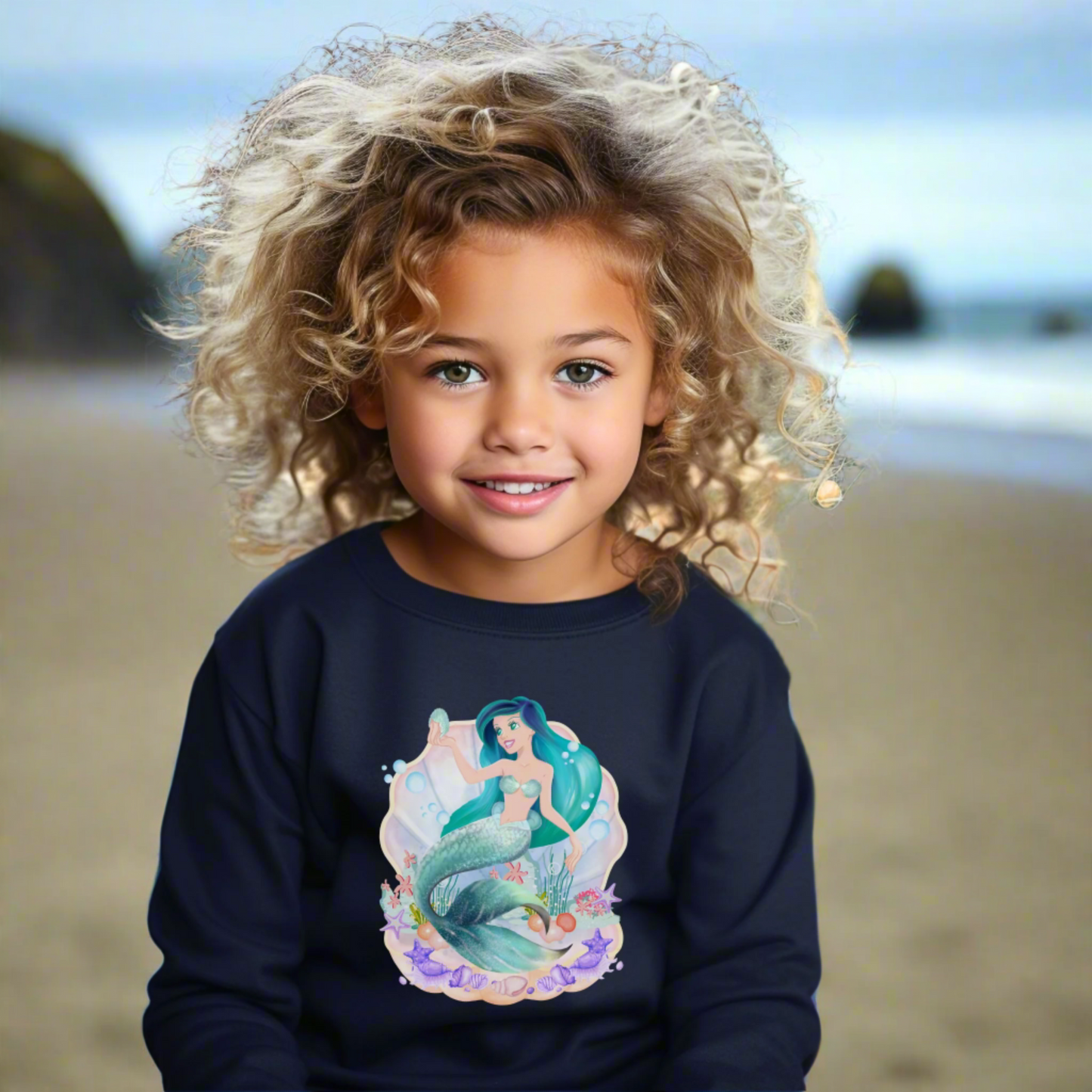 Image: Mermaid Sweatshirt for Little Girls. Pullover crewneck sweatshirt features a mermaid with blue hair and scales, swimming in a shell, with bubbles and seashells. This mermaidcore sweater is available in white, navy and hot pink, by jaecrece