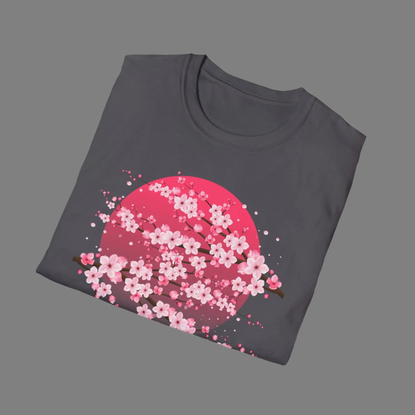 Image: A pink cherry blossom t-shirt featuring a delicate sakura tree design. The soft, durable fabric offers comfort, while the classic fit makes it versatile for any occasion. Perfect for springtime celebrations, Japanese aesthetic lovers, and those who appreciate kawaii fashion. Ideal as a gift for teens and adults. 