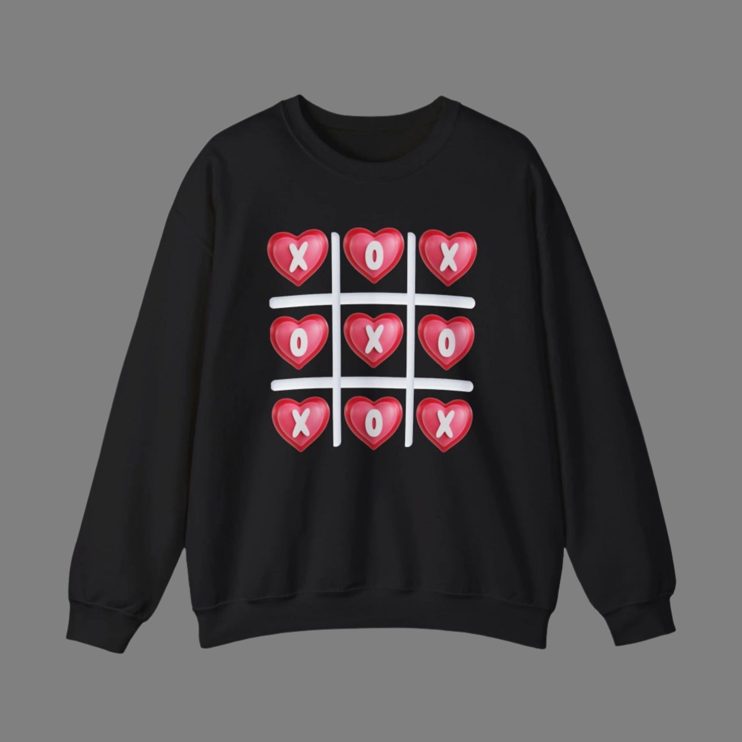 Image: XOXO Sweatshirt in Hot Pink, this crewneck pullover features a tic tac toe graphic with XOXO in 3D Conversation Hearts. Ideal as a teen gift for her or Galentines day. Available in Hot pink, light pink and black, by jaecrece