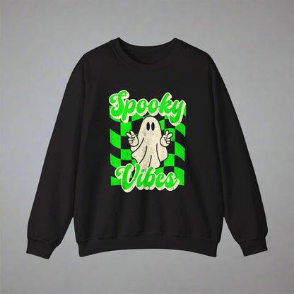 Black Halloween Unisex sweatshirt, featuring a green checkboard pattern, cute ghost giving the peace sign, and the text Spooky vibes, by jaecrece