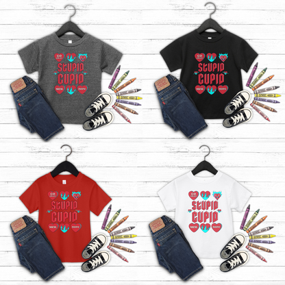 Image: Stupid Cupid Anti Valentines Day T-shirt for Kids. This sweatshirt is for girls and boys with red 90s style text that reads Stupid Cupid, with conversation hearts that are on fire, or say Go Away, Meh, Nope. Great for school party, by jaecrece