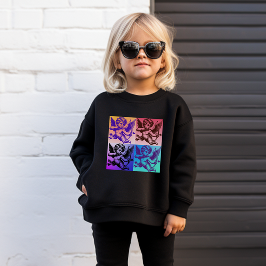 Youth girls Valentine’s Day sweatshirt features a bold Pop Art Cupid design with retro comic book flair. Perfect for girls, tweens, or teens who love colorful graphic sweatshirts, this cozy pullover is a fun option for February 14th. Ideal for school parties or casual matching family photos, it also pairs with the adult version for a mommy and me Valentine’s outfit. Great gift idea for stylish kids who love 1960s pop art style.