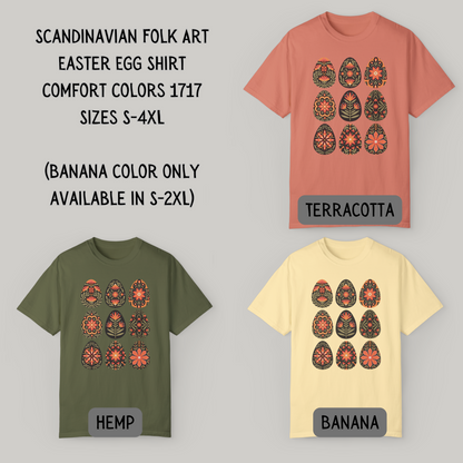 Image: This folk art Easter shirt features a vibrant floral and botanical Easter egg design with vintage Scandinavian influences. The intricate patterns reflect traditional Nordic craftsmanship, creating a timeless spring fashion statement. Perfect for casual outings or Easter festivities, this soft and stylish t-shirt brings together the beauty of cottagecore, boho aesthetics, and Swedish hygge in one charming piece, by jaecrece.