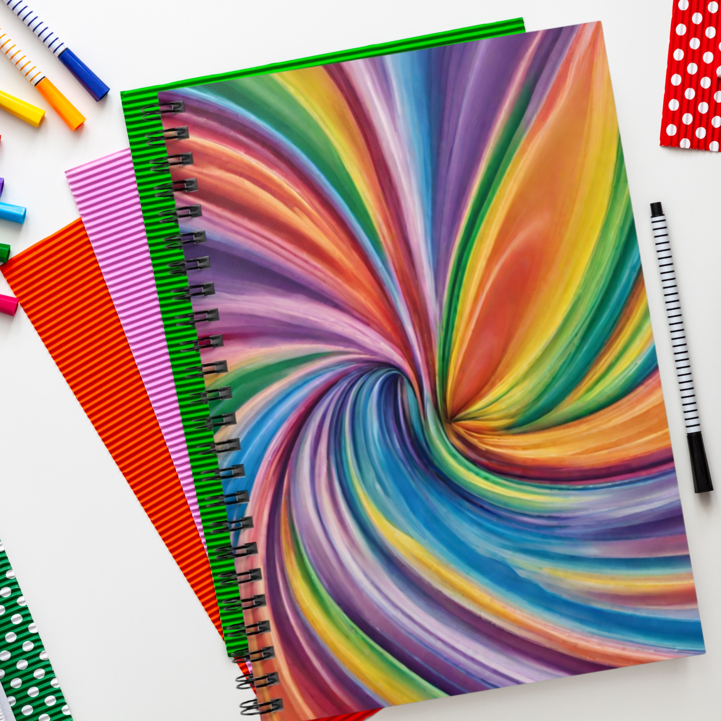 Colorful spiral-bound notebook with abstract rainbow swirl design, featuring lined pages and durable cover for everyday use. Ideal for journaling, school notes, or creative writing, this vibrant Pride-themed notebook is perfect for students, artists, or LGBTQ stationery lovers. A fun and functional gift idea for back to school, birthdays, or anyone who enjoys expressive rainbow office supplies.


