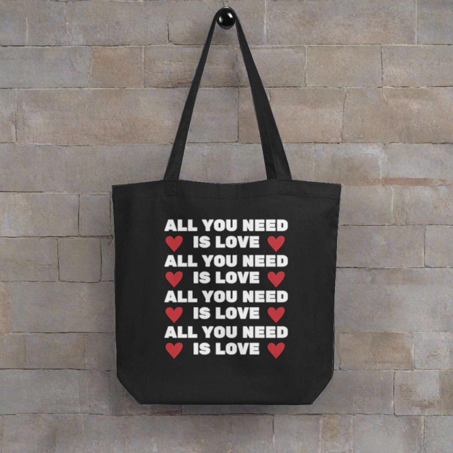 Eco-friendly All You Need is Love tote bag printed on both sides, made with organic cotton and strong enough for books, groceries, or gym gear. A thoughtful, sustainable gift for women, teachers, and friends who appreciate reusable bags with positive messages. This versatile carryall is perfect for birthdays, Valentine’s Day, or as a just-because surprise for someone who loves cute, conscious style.

