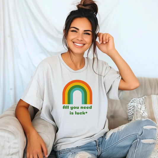 Adult unisex St Patricks Day shirt with the phrase All You Need is Luck in a festive lucky themed design. This soft cotton graphic tee is perfect for St Patricks Day parties, parades, pub celebrations, and casual holiday outfits. A comfortable lucky shirt for men and women that also coordinates with matching infant and kids sizes for fun family outfits, holiday photos, and festive March celebrations celebrating Irish pride and good fortune.