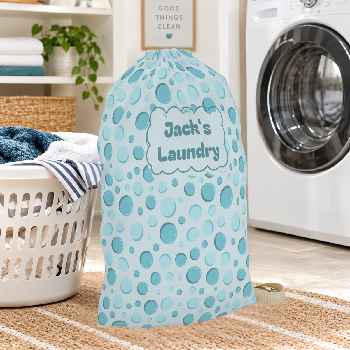 Aqua bubble print drawstring laundry bag measuring 18 × 29 inches, featuring a colorful playful bubble pattern on a light blue background and plain cream drawstrings. This personalized style laundry bag is ideal for kids, tweens, and teens heading to summer camp, sleepovers, school trips, or family vacations.