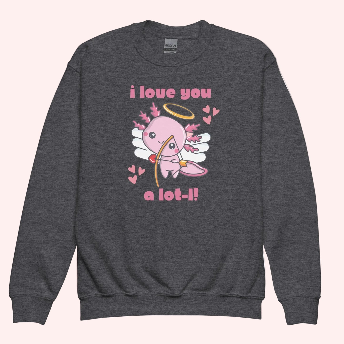 Flat lay of youth axolotl Valentine sweatshirts displayed in heather grey, each featuring the adorable axolotl cupid design with wings, halo, hearts, and the phrase I love you a lot l. The classic crewneck style highlights the soft fleece fabric and vibrant print quality. Designed in child sizes XS through XL, these sweatshirts are perfect for kids Valentine outfits, school wear, and matching family apparel.