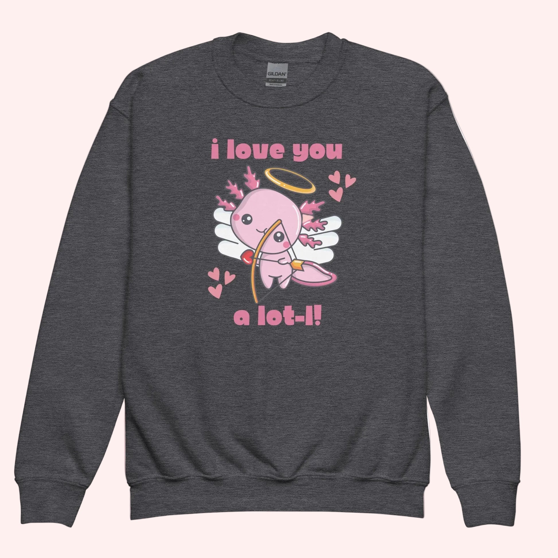 Flat lay of youth axolotl Valentine sweatshirts displayed in heather grey, each featuring the adorable axolotl cupid design with wings, halo, hearts, and the phrase I love you a lot l. The classic crewneck style highlights the soft fleece fabric and vibrant print quality. Designed in child sizes XS through XL, these sweatshirts are perfect for kids Valentine outfits, school wear, and matching family apparel.