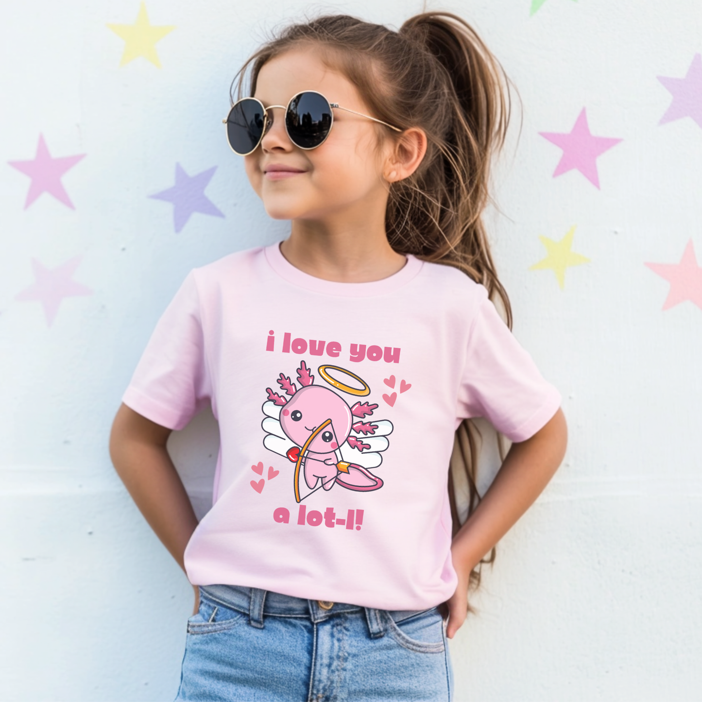 Kids Valentine axolotl shirt with a sweet pink cupid axolotl graphic and funny I Love You a Lotl message. Adorable Valentine’s Day clothing for children who love cute animals, playful puns, colorful graphics, and cozy casual outfits.
