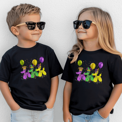This Mardi Gras girls or boys t-shirt is perfect for New Orleans fun! It features three balloon dogs dressed in purple, green, and gold with beads and confetti—ideal for family matching during French Quarter parades. The "walk it like a dog" design adds a playful twist for kids who want to celebrate Mardi Gras in bold style. Soft, breathable, and festive—great for parade day or class parties.