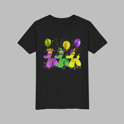 Image: Mardi Gras Balloon Dog Kids Tee Flatlay. Bold, playful, and parade-ready—this youth Mardi Gras t-shirt brings New Orleans fun to life with three balloon dogs in purple, green, and gold. With their Carnival masks, beads, and hats, these pups are ready to "walk it like a dog" through the French Quarter! Designed for family matching moments and festive fun, it's the perfect choice for any kid celebrating Mardi Gras in style.