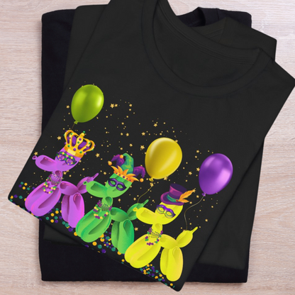 This playful Mardi Gras tee showcases a trio of balloon dogs in vibrant green, gold, and purple, floating with festive confetti on a classic black shirt. A quirky and fun twist on traditional Carnival designs, it’s perfect for parade lovers, NOLA tourists, and anyone embracing the French Quarter vibe. Soft, comfy, and available in extended sizes.