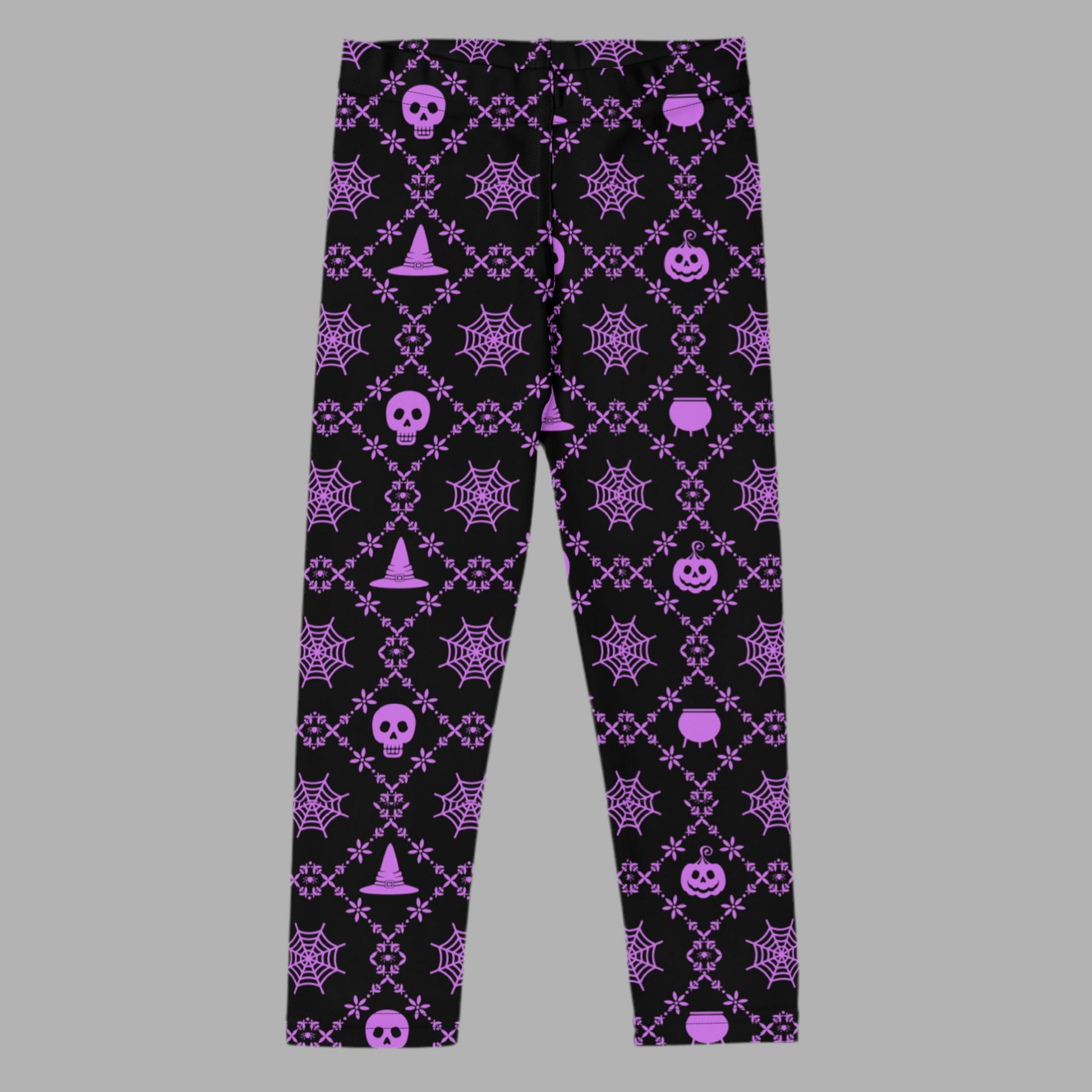 Black leggings with purple Halloween-themed pattern on a gray background