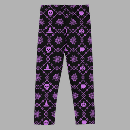 Black leggings with purple Halloween-themed pattern on a gray background