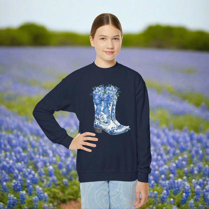 Image: Blue Toile Boots and Bows Girls Sweatshirt in sizes for girls and toddlers. This pullover sweater features a pair of coastal cowgirl aesthetic cowboy boots with a blue bow and blue wildflowers. This country themed sweater makes a perfect gift for your daughter, by jaecrece