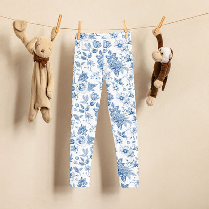 Image: Blue toile girls leggings for toddlers and kids in sizes 2T to 7 featuring a vintage-inspired French toile print, perfect for spring family photos, matching sibling outfits, or everyday stylish playwear. These soft, stretchy pants are part of a matching family collection, ideal for little girls who love twirling, exploring, and staying comfy all day, by jaecrece.