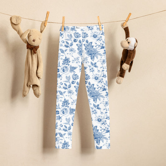 Image: Blue toile girls leggings for toddlers and kids in sizes 2T to 7 featuring a vintage-inspired French toile print, perfect for spring family photos, matching sibling outfits, or everyday stylish playwear. These soft, stretchy pants are part of a matching family collection, ideal for little girls who love twirling, exploring, and staying comfy all day, by jaecrece.