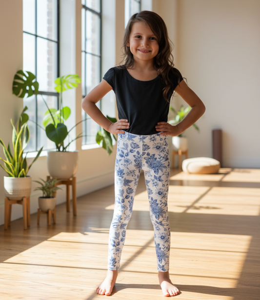 Image: Blue toile toddler girls leggings in vintage cottagecore style, perfect for dressing up or casual everyday wear. Sizes 2T to 7 available in a soft stretchy material ideal for preschool, weekend outings, or dressy moments. A charming gift for birthdays or Easter, and perfect for family matching photo sessions, by jaecrece.