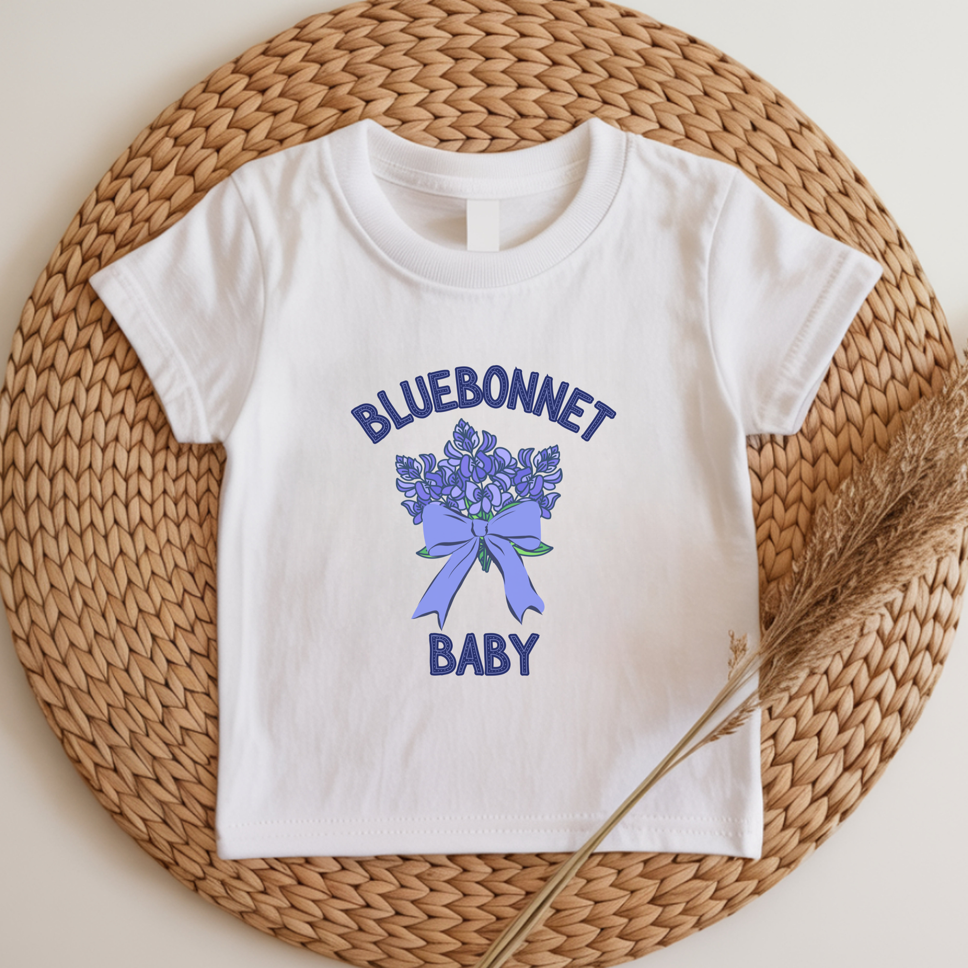 Texas bluebonnet T shirt featuring a classic Texas wildflower design, creating a cute spring baby outfit for family photos, wildflower walks, outdoor adventures and celebrating Texas pride