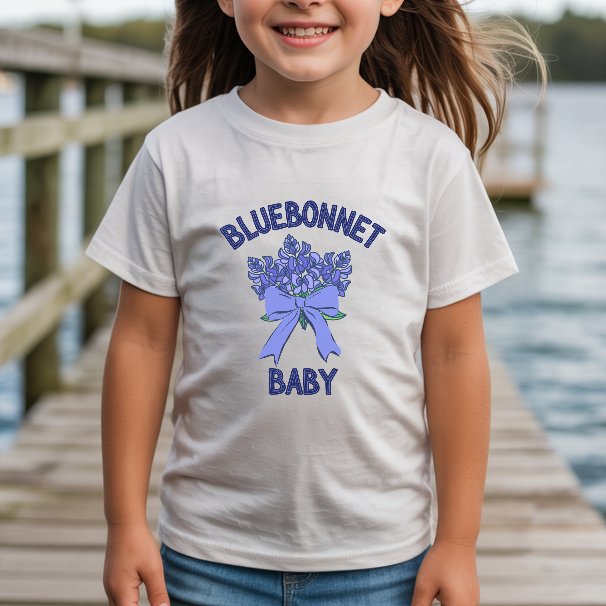 Texas baby gift featuring a bluebonnet baby T shirt printed on a soft BELLA CANVAS infant tee, a charming Texas wildflower shirt for baby showers, new parents, spring celebrations and families looking for unique Texas baby clothes