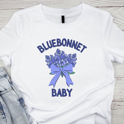 Image: This cute toddler t-shirt features a stunning bluebonnet design, making it a great outfit for spring adventures. The breathable cotton fabric ensures comfort for all-day wear at family gatherings, nature walks, or Easter celebrations. Designed with Texas pride in mind, it’s a must-have for parents who love their state’s wildflowers. A perfect baby shower gift or birthday present for Texas-born little ones, this tee is a springtime favorite, by jaecrece.