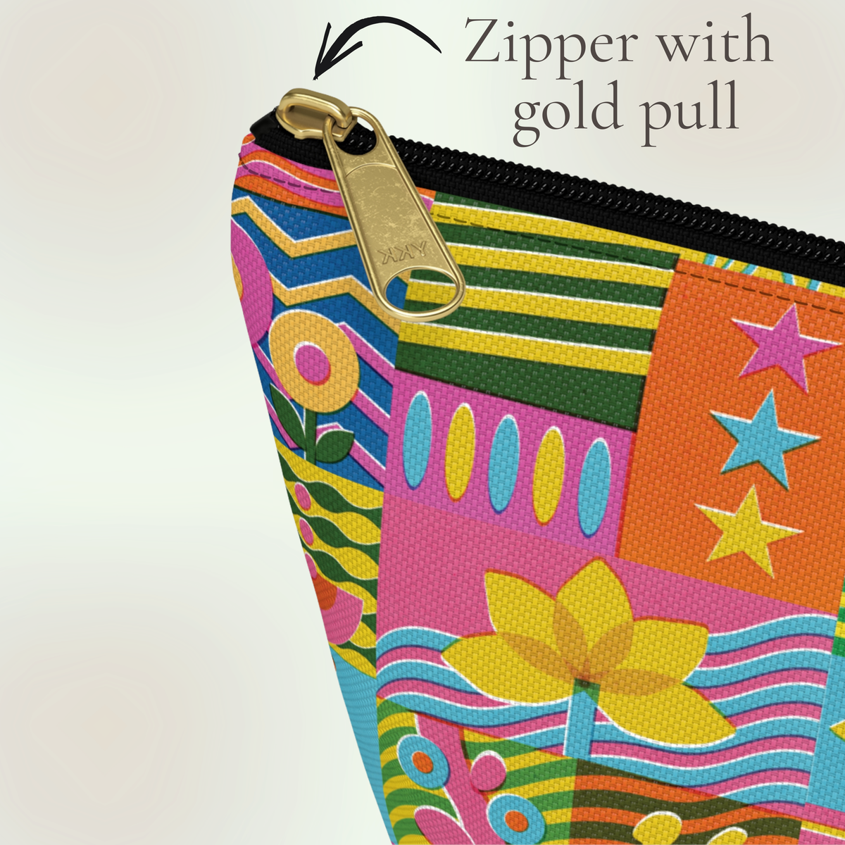 Close up of a personalized art supply pouch featuring a vibrant retro pattern of flowers, stripes, stars, geometric shapes, and playful lines. The custom name makes this colorful bag feel special while the roomy T bottom provides space for markers, pencils, brushes, craft supplies, and other creative tools. A fun choice for artistic girls, tweens, and teens who enjoy colorful, whimsical, and eclectic accessories.