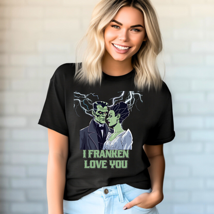 Playful romantic Halloween tee with Frankenstein and Bride of Frankenstein in a lightning storm, saying “I Franken Love You.” Unisex black Gildan 64000 shirt, available S-5XL. Great for monster lovers, couple costumes, Halloween parties, or funny spooky gifts.